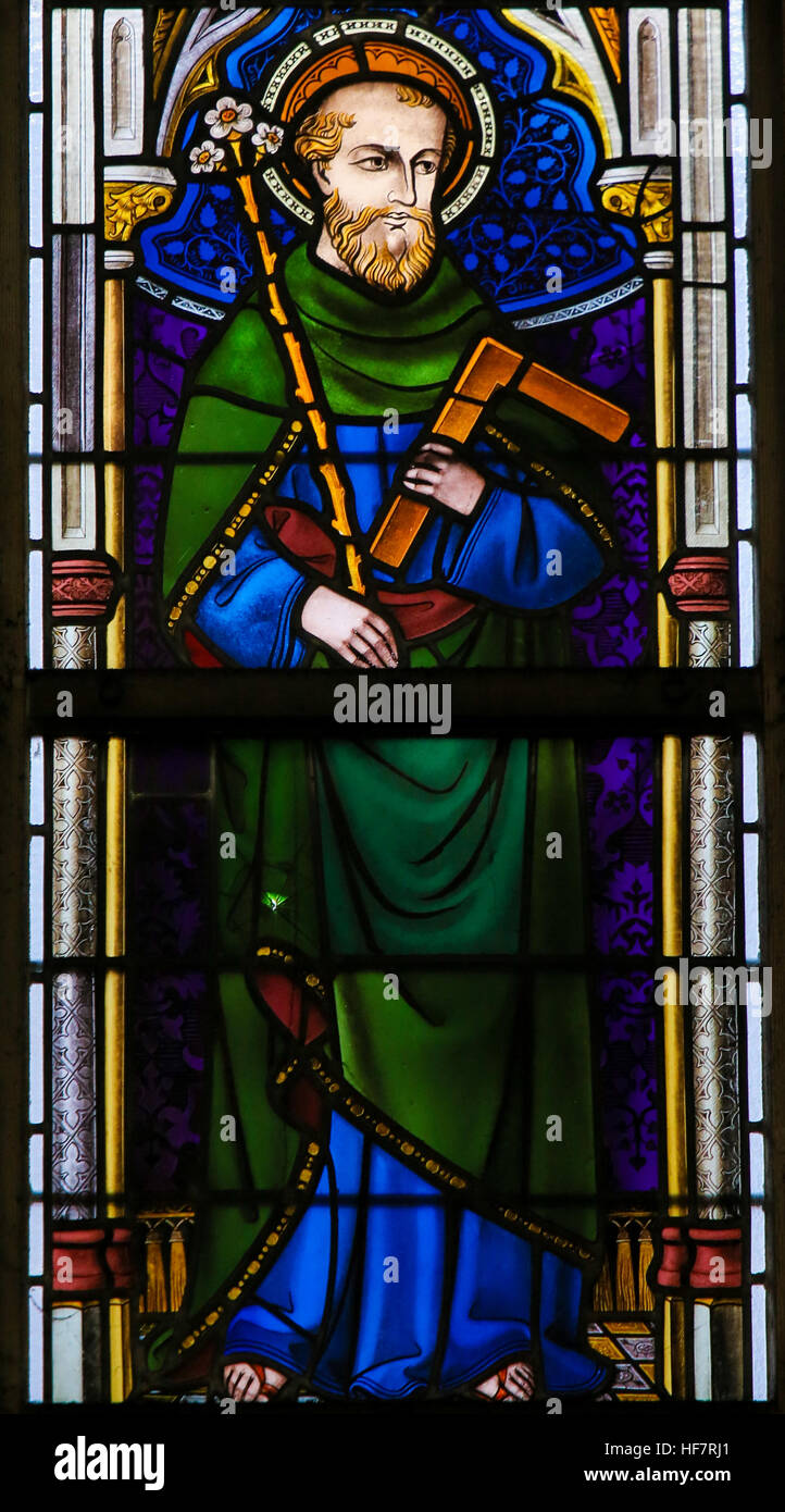 Stained Glass depicting Saint Joseph holding a lily and carpentry square, in the Cathedral of Saint Bavo in Ghent, Belgium. Stock Photo