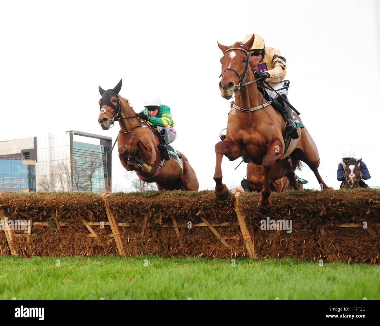 Meri Devie ridden by Ruby Walsh (right) before winning the Paddy Power Ã¢Â€Â˜Only 363 Days Till ChristmasÃ¢Â€Â™ 3-Y-O Maiden Hurdle ahead of Housesofparliament ridden by Barry Geraghty (left) during day two of the Christmas Festival at Leopardstown Racecourse. Stock Photo