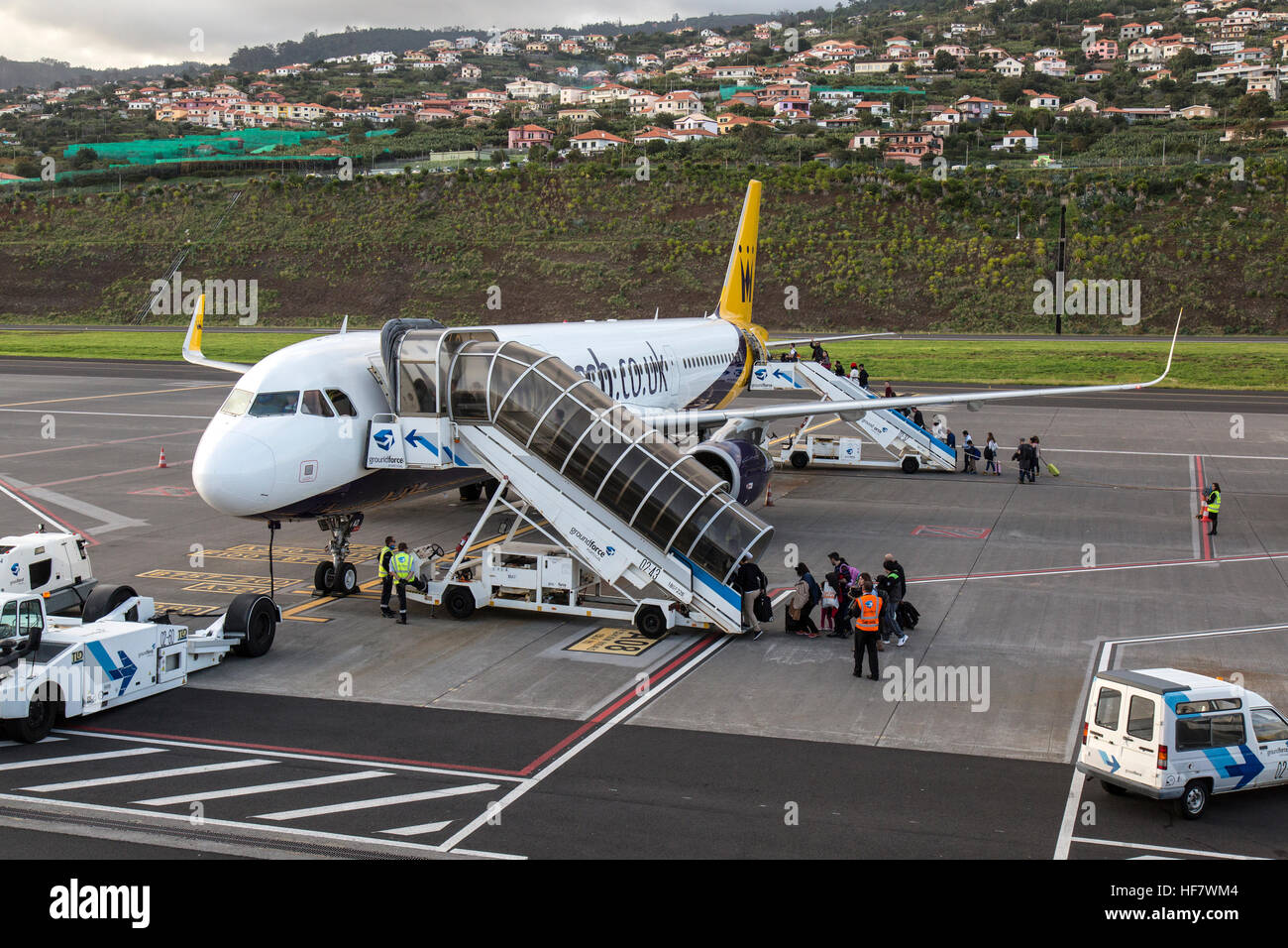 Monarch Airlines A321 Airbus G-ZBAD at Funchal Airport on the island of Madeira. Passengers boarding. Stock Photo