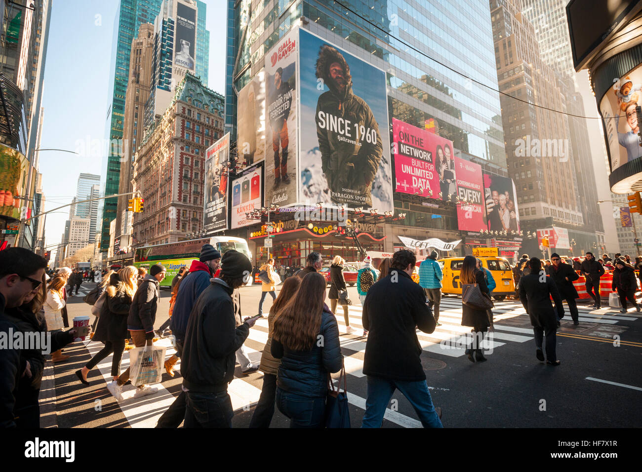 Billboards in Times Square advertise the Swedish outdoor company Fjällräven on Tuesday, December 20, 2016. The brand has only been selling in the United States since 2012 and the billboards, combined with print, digital and a pop-up space is their largest campaign to date. (© Richard B. Levine) Stock Photo