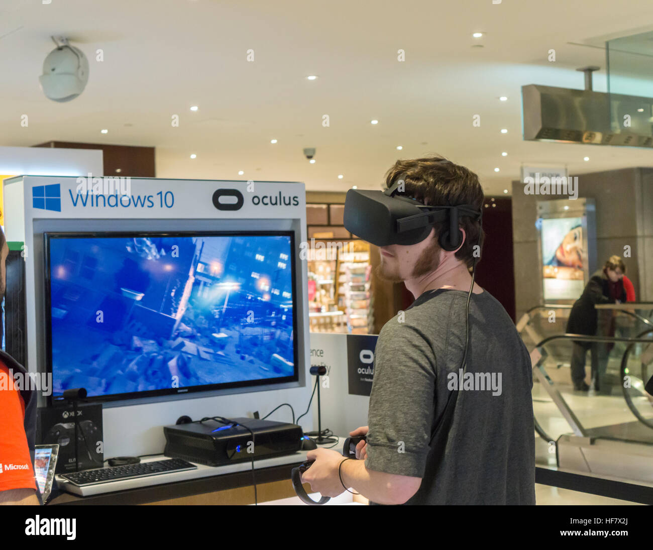 Customers try out Oculus virtual reality goggles powered by