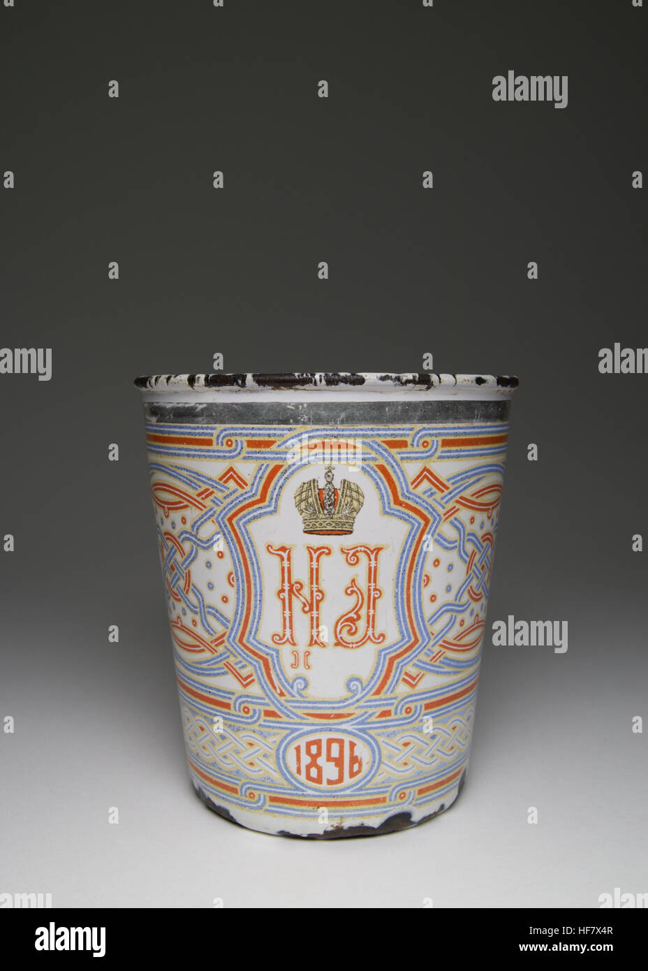 Beaker was made to commemorate the Russian Imperial Coronation of Tsar Nicholas II. The beaker measures 10.5cm high. The photographs show the beaker f Stock Photo
