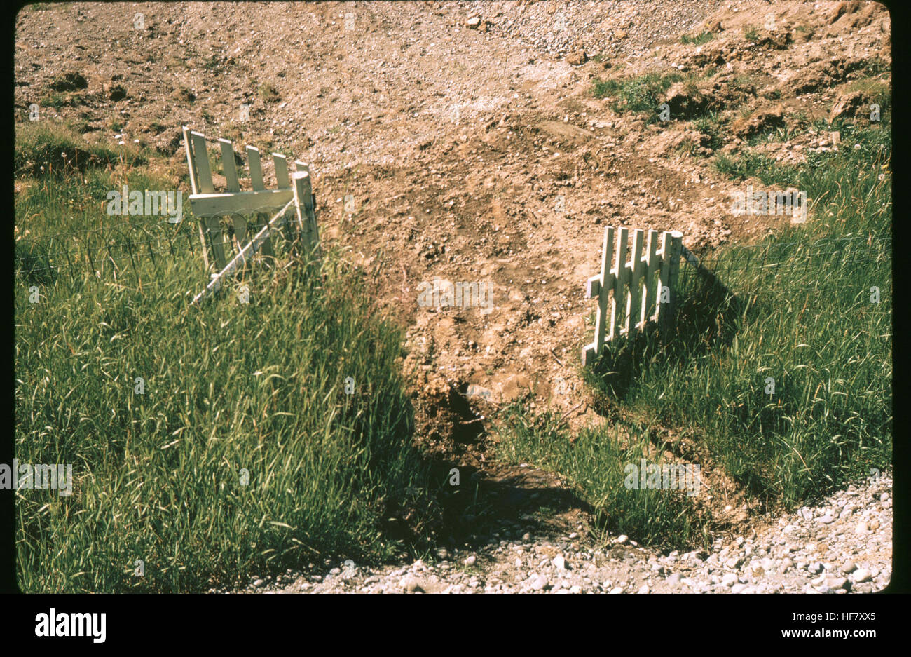 Offset of a fence due to earth movement. Result of earthquake of March 27th, 1964; near Anchorage, Alaska. Stock Photo