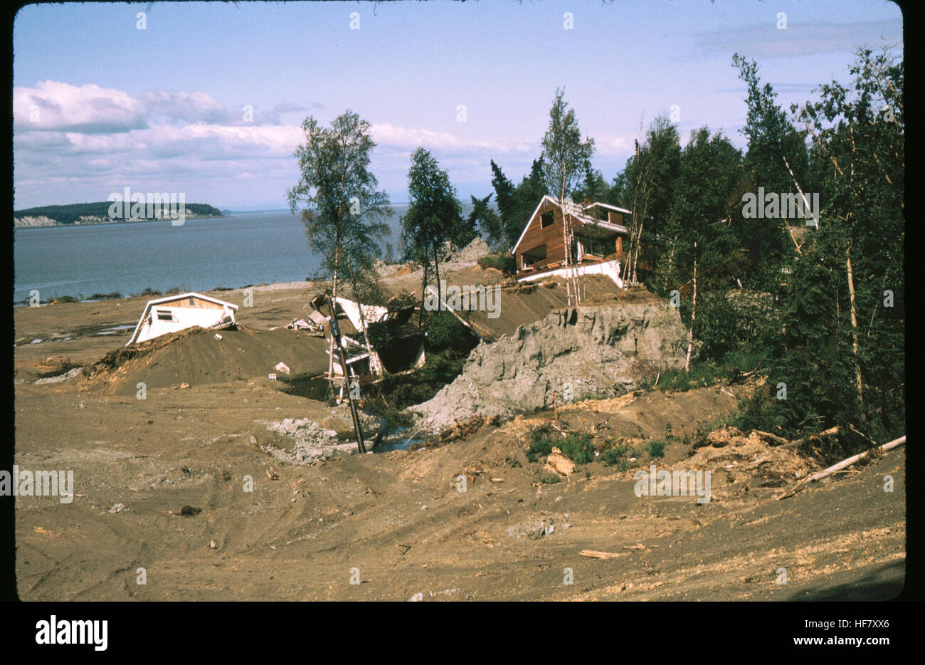 Strong earth movement and toppled-down houses as a result of earthquake of March 27th 1964; near Anchorage, Alaska. Stock Photo