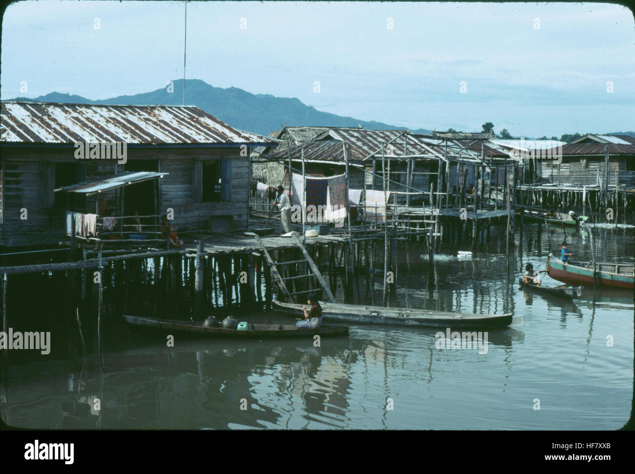Muslim fishing village with houses on stilts, near Kota Kinabalu; Sabah, North Borneo, Malaysia. Stock Photo