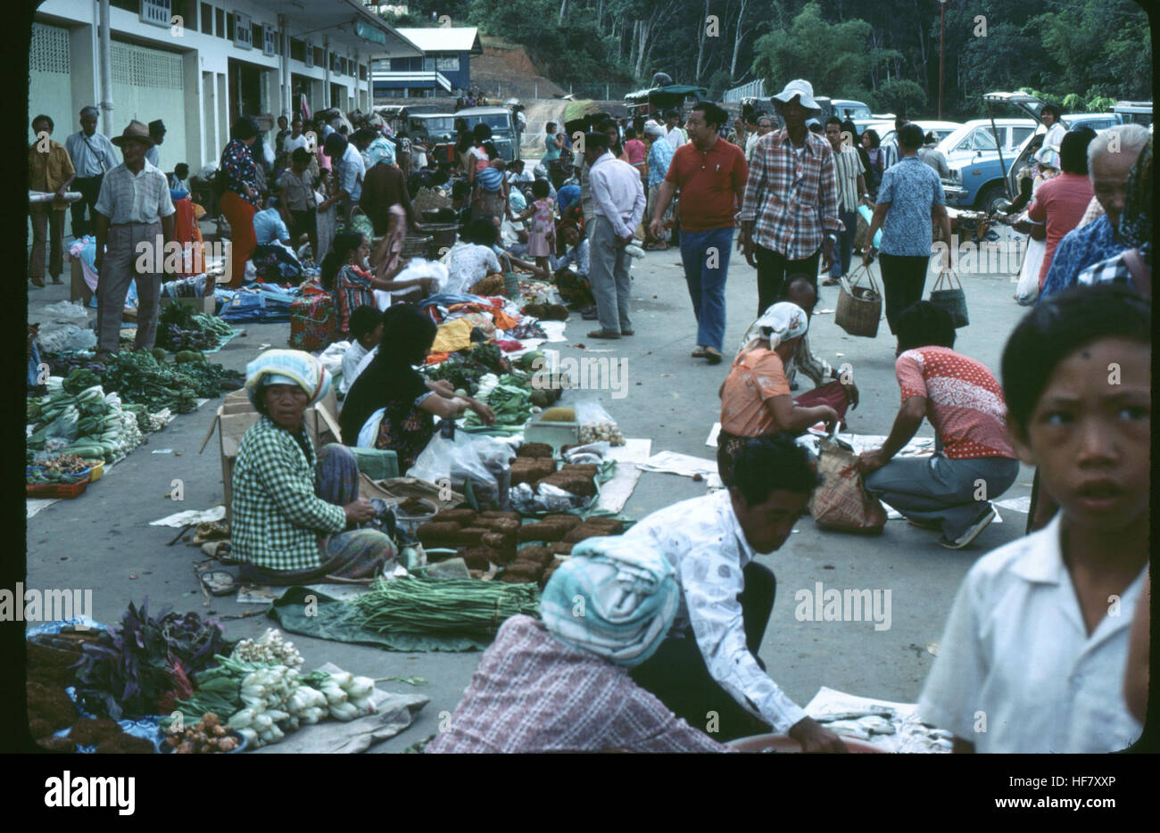 Buyers and sellers at a street market; area of Kota Kinabalu, Sabah, N Borneo, Malaysia. Stock Photo