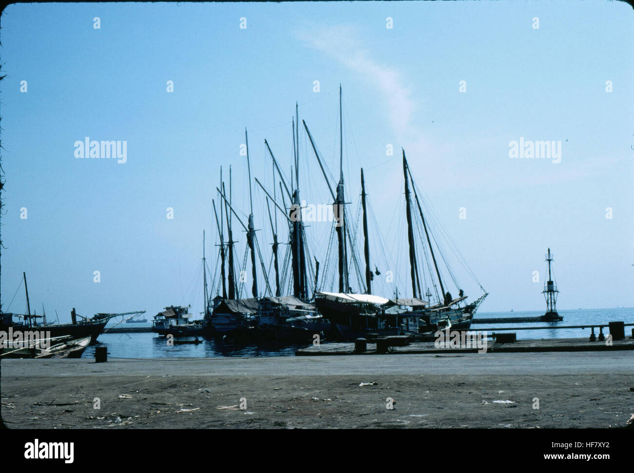 Native schooners in the old harbor; Jakarta, Java, Indonesia. Stock Photo