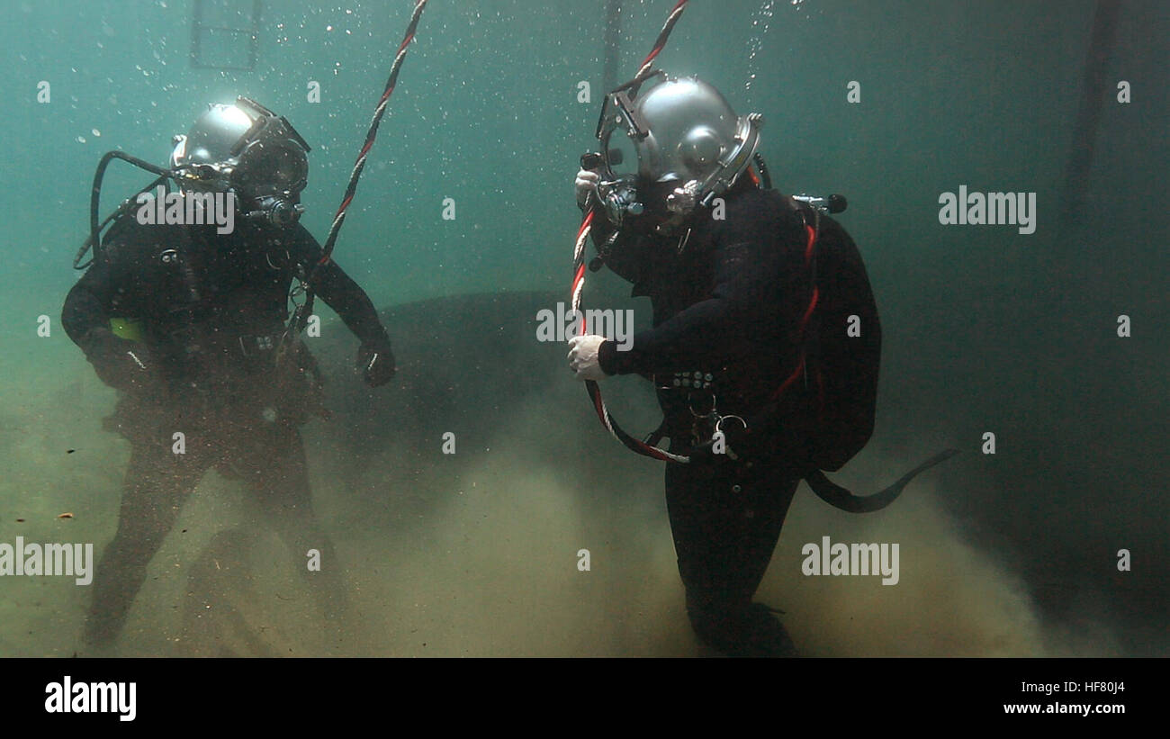 U.S. Border Patrol agents of the BORSTAR dive team train in the use of surface supplied using Kirby Morgan dive helmets at Morrison Springs near Panama City, Fla., May 24, 2016.  by Glenn Fawcett Stock Photo