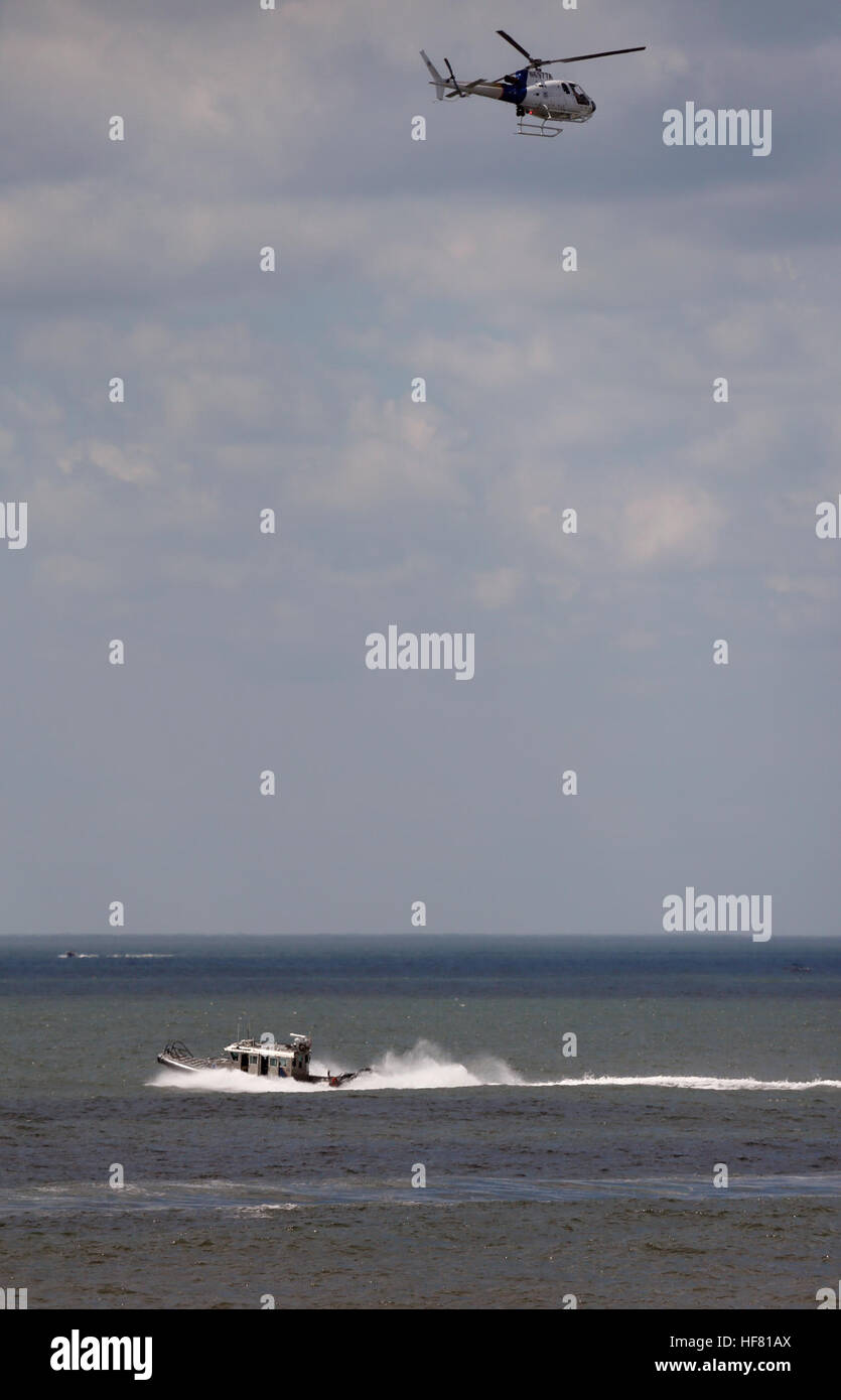 A U.S. Customs and Border Protection AS350 A-Star helicopter and a SAFE ...