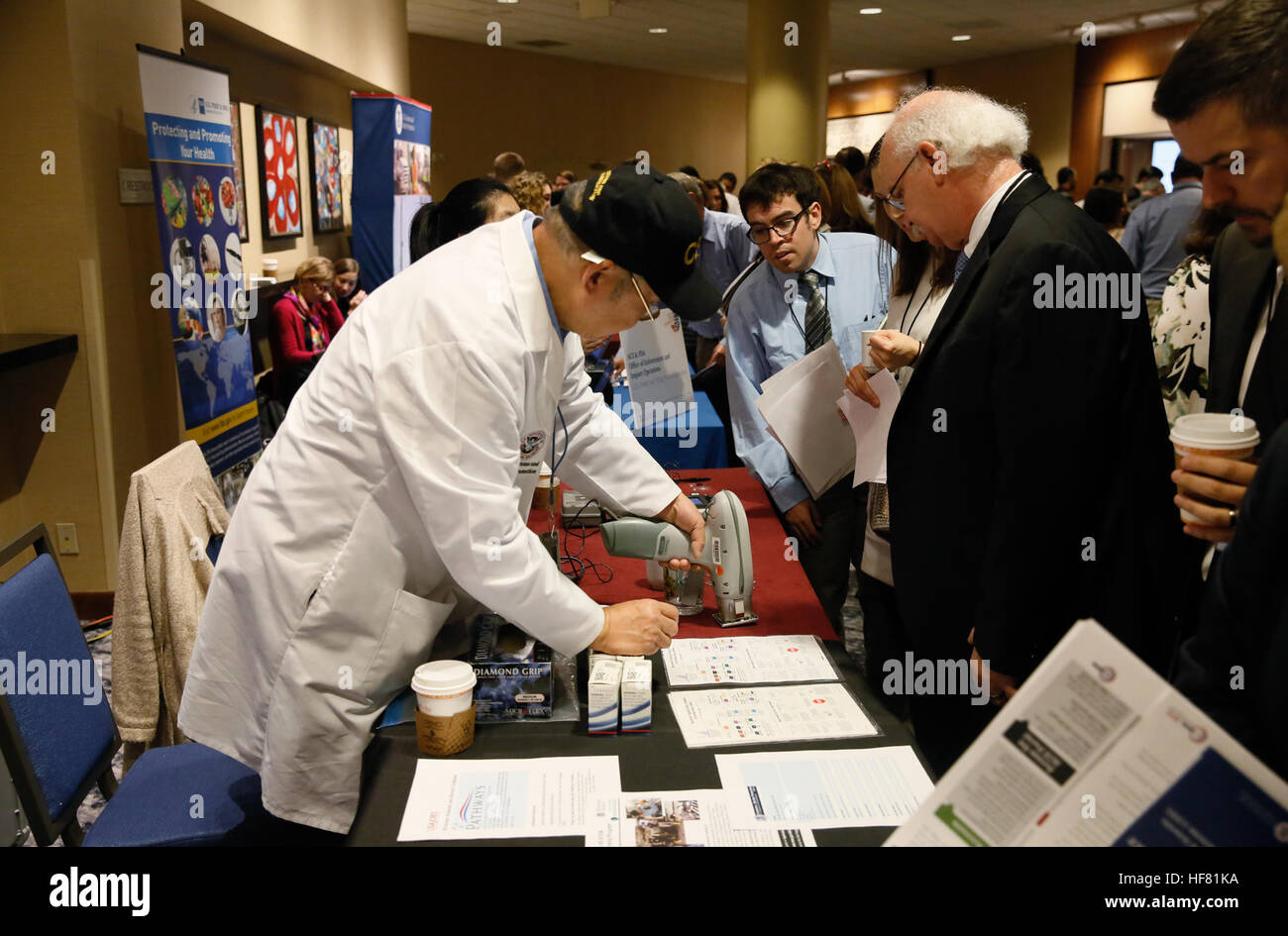 A member of the U.S. Customs and Border Protection crime lab ...
