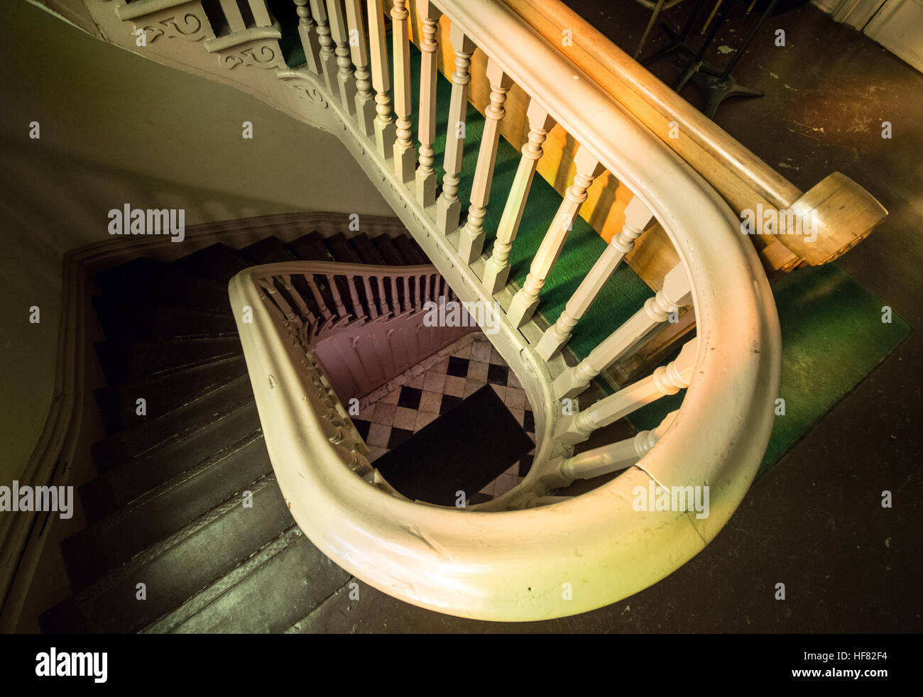 Wooden stairwell ascending in a Roman Catholic Church. Stock Photo