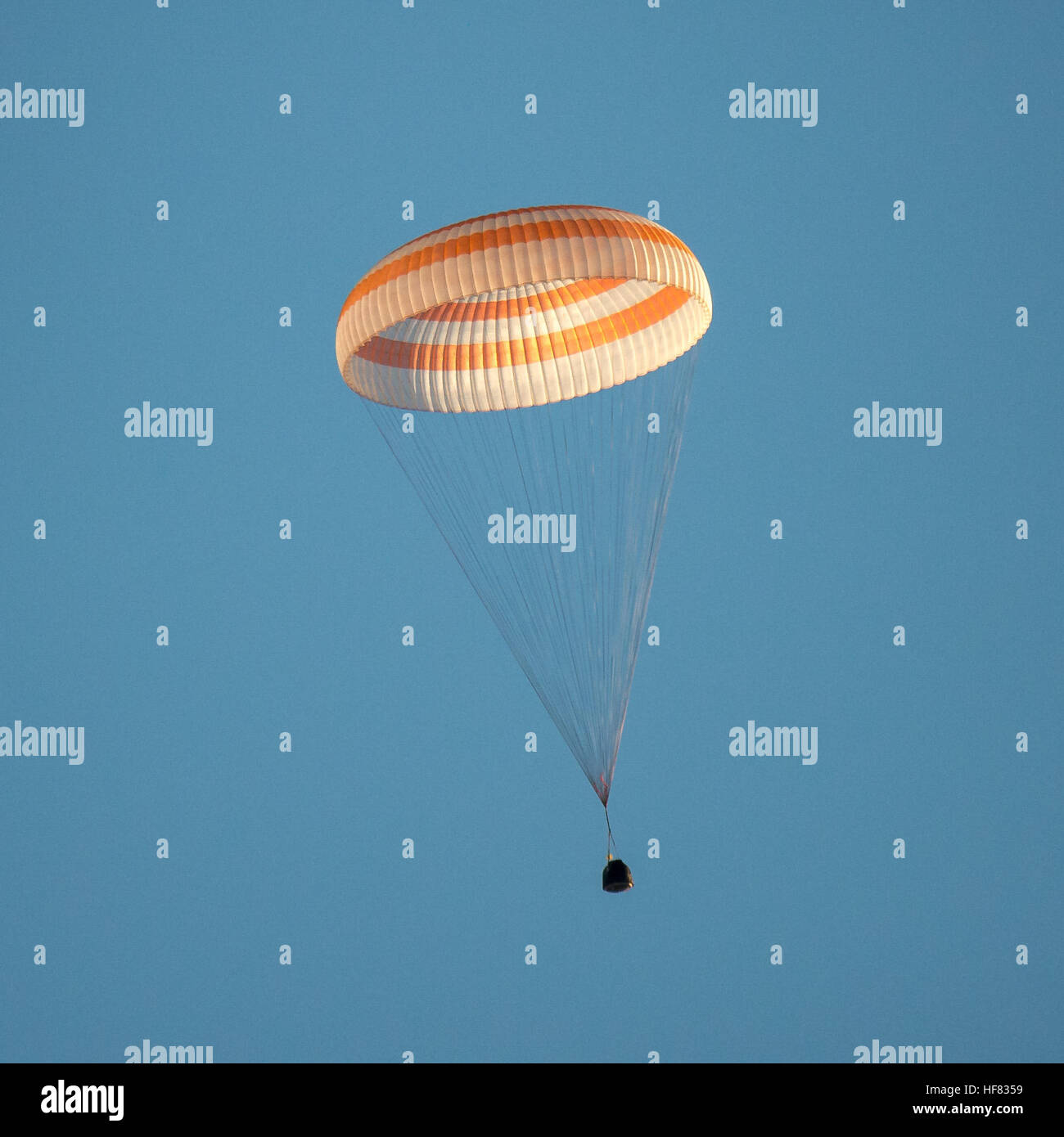 The Soyuz TMA-20M spacecraft is seen as it lands with Expedition 48 crew members NASA astronaut Jeff Williams, Russian cosmonauts Alexey Ovchinin, and Oleg Skripochka of Roscosmos near the town of Zhezkazgan, Kazakhstan on Wednesday, Sept. 7, 2016(Kazakh time). Williams, Ovchinin, and Skripochka are returning after 172 days in space where they served as members of the Expedition 47 and 48 crews onboard the International Space Station. Stock Photo