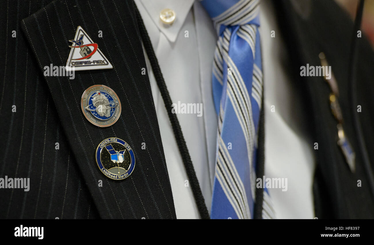 Pins for NASA's NASA's Origins, Spectral Interpretation, Resource Identification, Security-Regolith Explorer (OSIRIS-REx) mission are seen on the lapel of Director of NASA's Launch Services Program in the Human Exploration &amp; Operations Mission Directorate James Norman as he monitors the countdown for the launch of the Untied Launch Alliance Atlas V rocket carrying the OSIRIS-REx spacecraft from the Atlas Spacecraft Operations Center on Thursday, Sept. 8, 2016 at Cape Canaveral Air Force Station in Florida. OSIRIS-REx will be the first U.S. mission to sample an asteroid, retrieve at least t Stock Photo