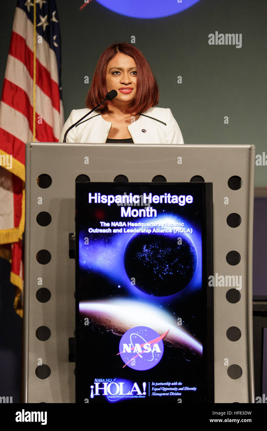 Maria Santos, chair of the Hispanic Outreach and Leadership Alliance (HOLA) at NASA Headquarters, welcomes attendees to Aspira con NASA/Aspire with NASA Hispanic Heritage Month event on Tuesday, Oct. 4, 2016 at NASA Headquarters in Washington. The event featured talks by Diana Trujillo, mission lead for the Mars Curiosity Rover at NASA Jet Propulsion Laboratory in California, and former NASA astronaut José Hernández. Stock Photo