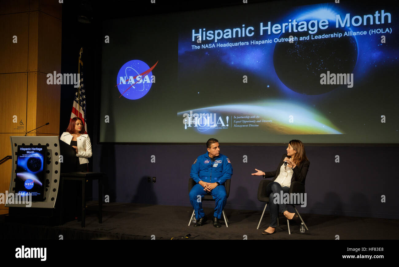 Maria Santos, chair of the Hispanic Outreach and Leadership Alliance (HOLA) at NASA Headquarters, left, moderates a question and answer session with former NASA astronaut José Hernández, center, and Diana Trujillo, mission lead for the Mars Curiosity Rover at NASA's Jet Propulsion Laboratory, right, during the Aspira con NASA/Aspire with NASA Hispanic Heritage Month event on Tuesday, Oct. 4, 2016 at NASA Headquarters in Washington. Stock Photo