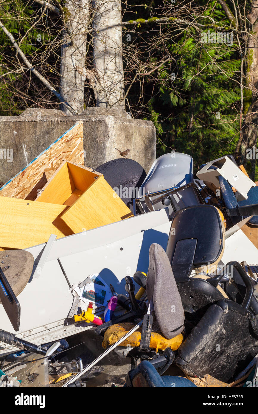 Pile of office garbage and chairs for recycling Stock Photo Alamy