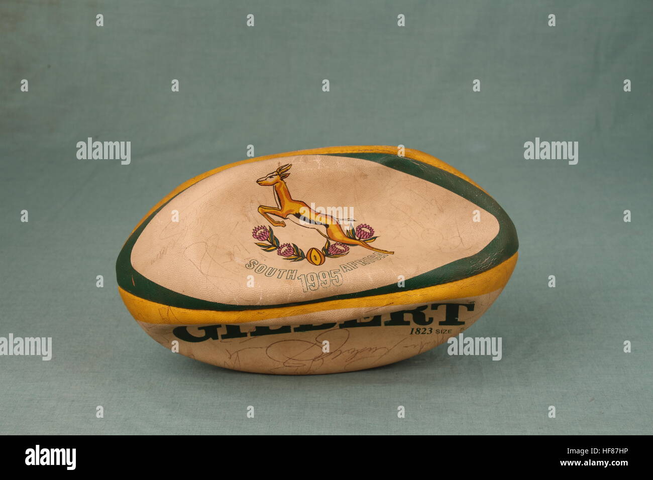 A deflated rugby ball isolated on a clear background image with copy