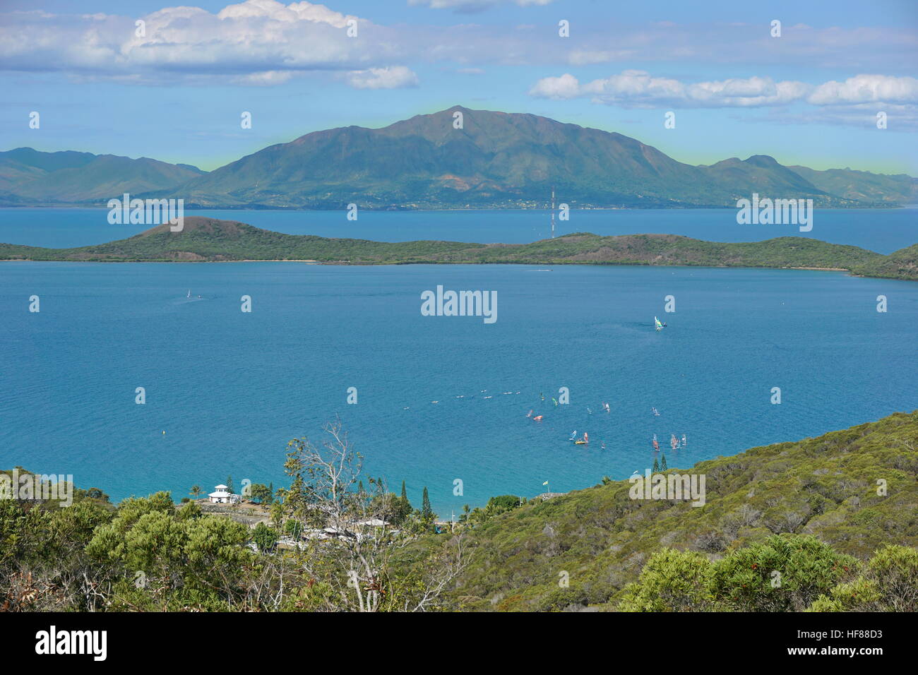 Sainte Marie bay and island with the mountain Mont Dore in background, seen from the Ouen Toro parc in Noumea city, Grande Terre, New Caledonia, south Stock Photo