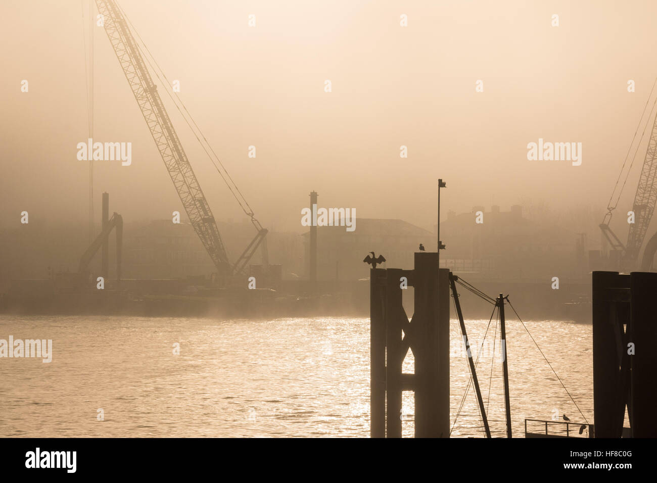 London, UK 28th December 2016. A Foggy morning in London makes for magical light on the river Thames. © Patricia Phillips/ Alamy Live news Stock Photo