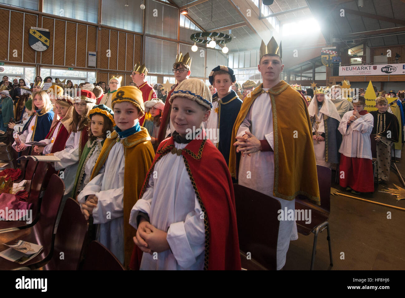 Star singers (also known as epiphany singers) take part in the opening ceremony of the nationwide German star singing action in Neumarkt in der Oberpfalz, Germany, 29 December 2016. Star singers travel from house to house and ask for donations to charitable causes across the world every 6th January. Photo: Armin Weigel/dpa Stock Photo
