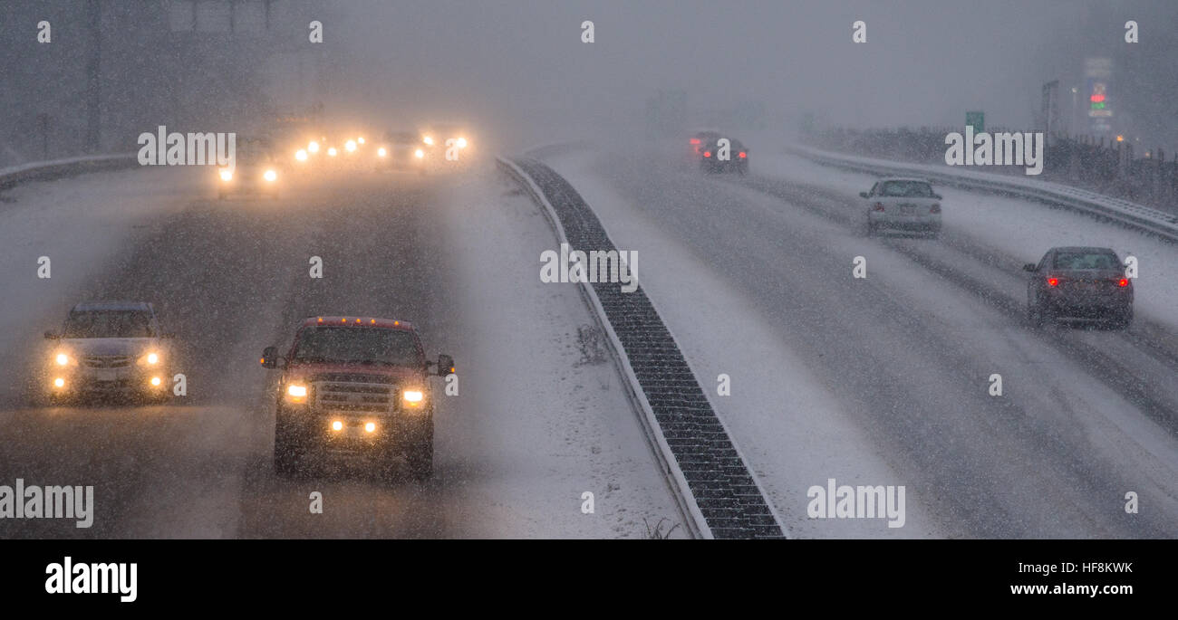 Westminster, Massachusetts, USA. 29 December, 2016. A winter storm projected to bring about a foot of snow to north central Massachusetts impacts the afternoon commute along Rt 2 in Westminster, Mass. Many motor vehicle crashes were reported throughout the region. Oncoming traffic is headed westbound.   © Jim Marabello/ Alamy Live News Stock Photo