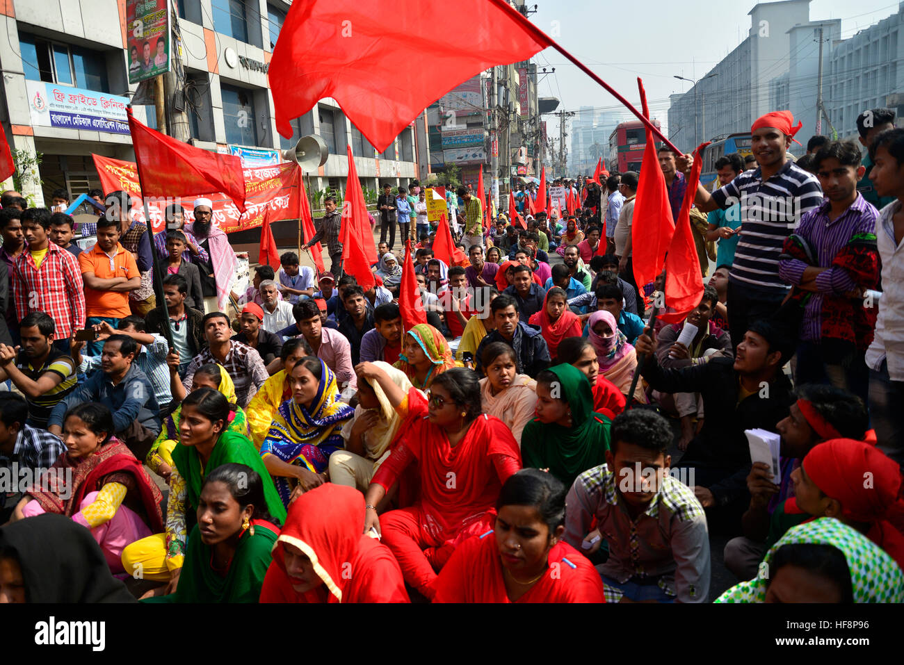 Dhaka, Bangladesh. 30th Dec, 2016. Garments worker trade union center organized a rally demanding minimum basic wage ten thousands (10,000) Taka and others demands in front of National Press Club in Dhaka, Bangladesh. On December 30, 2016 © Mamunur Rashid/Alamy Live News Stock Photo