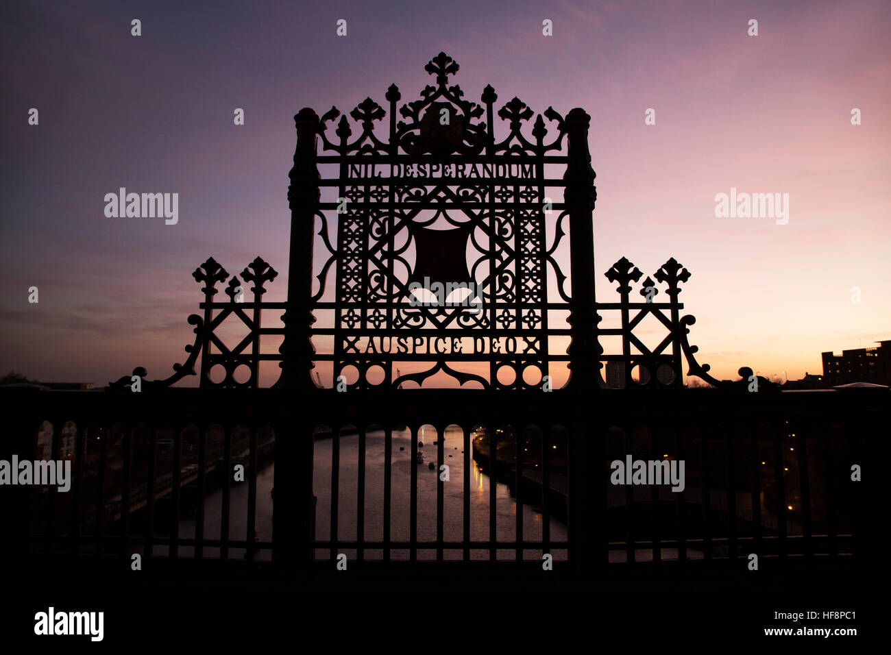 Sunderland, UK. 30th Dec, 2016. Daybreak over the River Wear and city crest of Sunderland, England. The coat of arms bears the Latin motto 'nil desperandum, auspice deo' meaning 'do not despair, trust in God'. © Stuart Forster/Alamy Live News Stock Photo