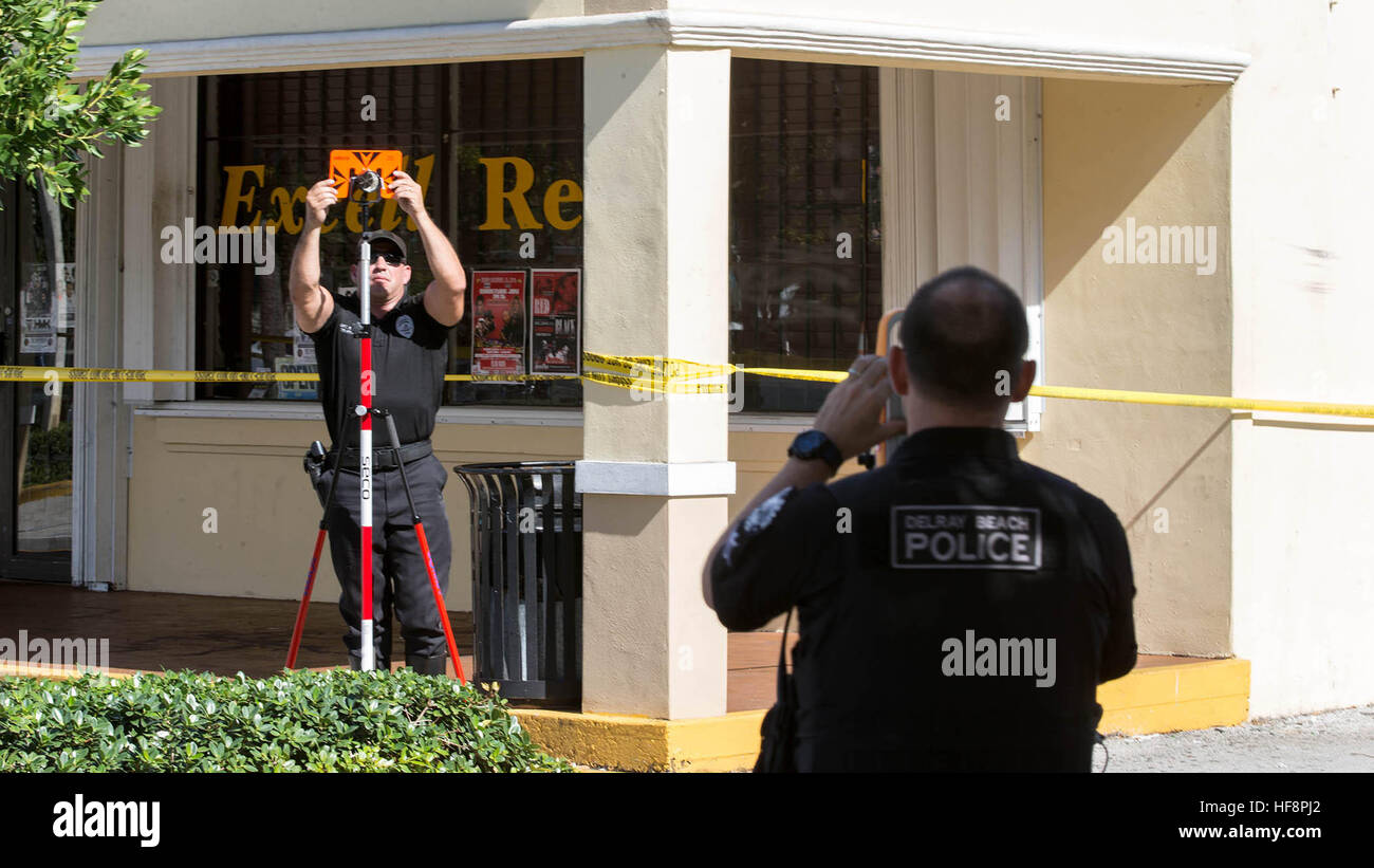West Palm Beach, Florida, USA. 30th Dec, 2016. Delray Beach police investigate a shooting outside Excell Restaurant & Bar in Delray Beach, FL on December 29, 2016. A 23-year-old man was killed early Thursday after an argument turned into a fatal shooting the bar according to city police. Niherson Gustave was shot at 1041 South Congress Ave. after 2 a.m. Thursday. Witnesses told police Gustave and friends were arguing with another group inside the club and then they were all ejected. The other group shot Gustave in the parking lot of the club. (Credit Image: © Allen Eyestone/The Palm Beac Stock Photo