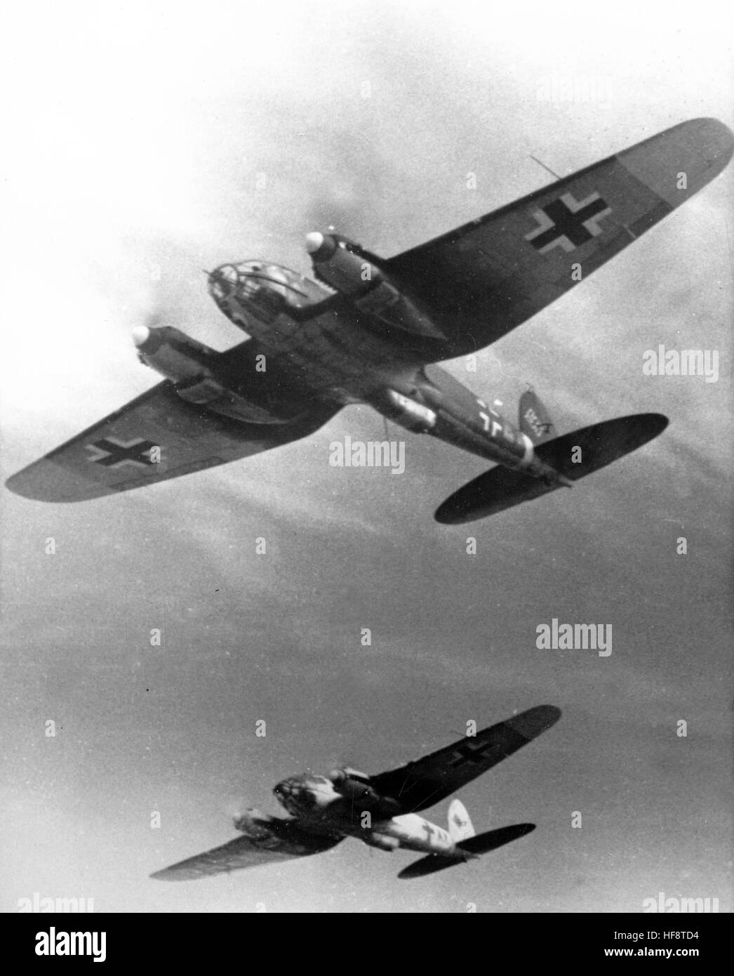 WW2 Propaganda photo of German Heinkel He 111 flying through flak
