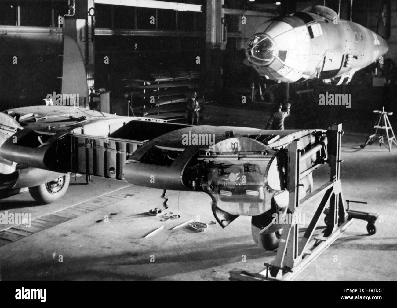 The Nazi propaganda image shows the production process of Heinkel He 111 combat planes in an assembly hall at the Ernst Heinkel Airplane Manufacturers. Published in May 1942.  [Further images from this photo series can be found under the title, "Der Mann und sein Werk" (The Man and his Works - referring to Ernst Heinkel, airplane manufacturer).] Fotoarchiv für Zeitgeschichte - NO  WIRELESS SERVICE - | usage worldwide Stock Photo
