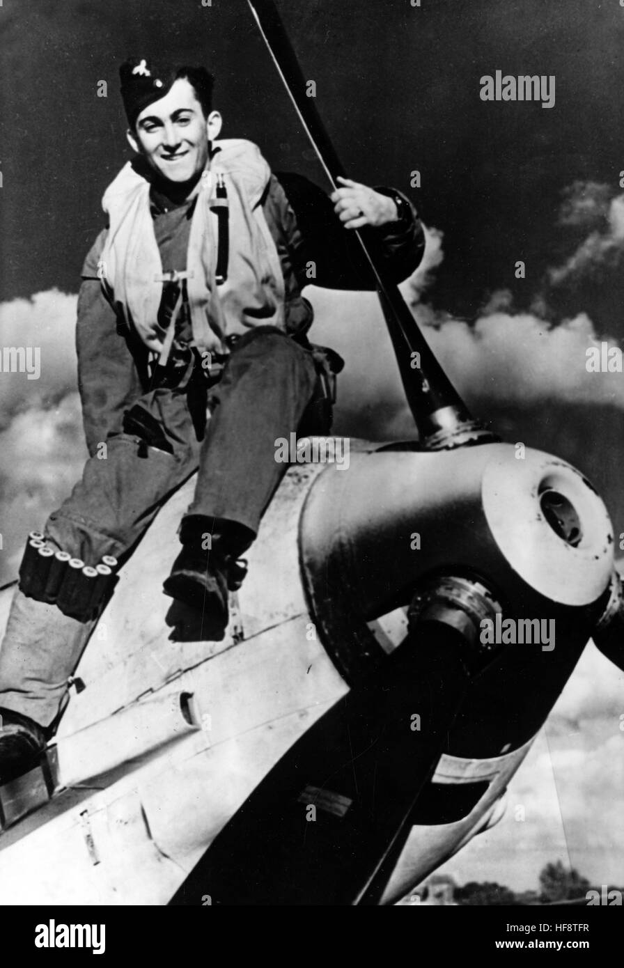 The Nazi propaganda image shows a young combat pilot of the German Luftwaffe on his Messerschmitt Bf 109 warplane. Published in November 1940. The Nazi reporter has written on the reverse of the picture on 07.11.1940, 'The 'Squirt' of the fighter squadron. Young as he may be, he has already successfully carried out more than 30 sorties. The foundations of his training were laid in his time in the Hitler Youth.' Fotoarchiv für Zeitgeschichte - NO WIRE SERVICE -   | usage worldwide Stock Photo