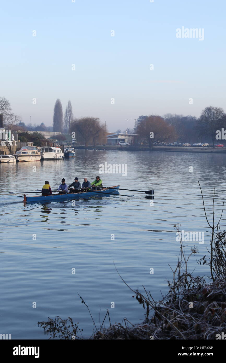 A rowing crew on the Thames on a bright, frosty winter's morning Stock