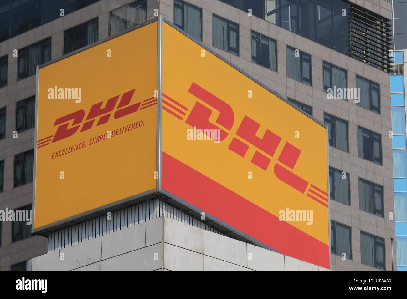 DHL Express. DHL Express is a division of the German logistics company Deutsche Post DHL providing international express mail services. Stock Photo