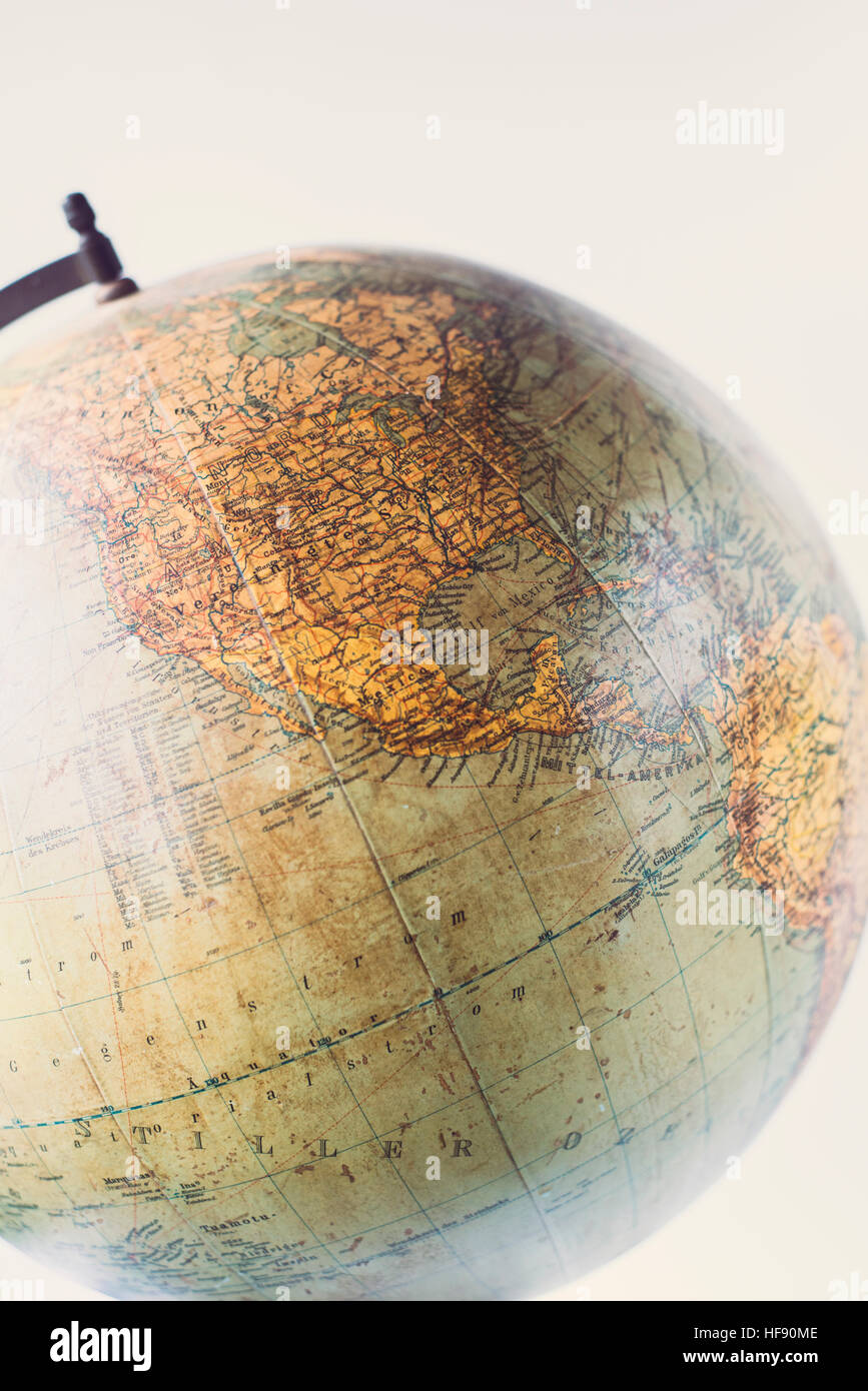 Still life of an antique globe on a white background Stock Photo - Alamy