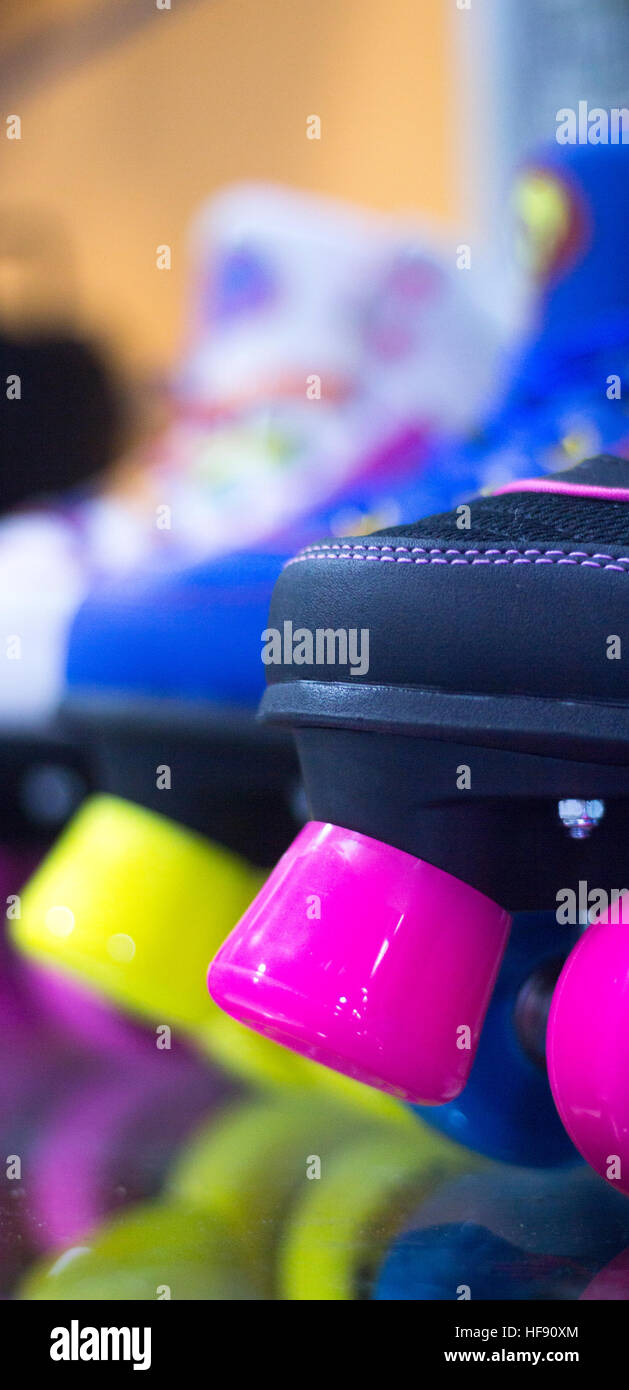 Quad skate rollerskates in skate store in shop window display. Skates
