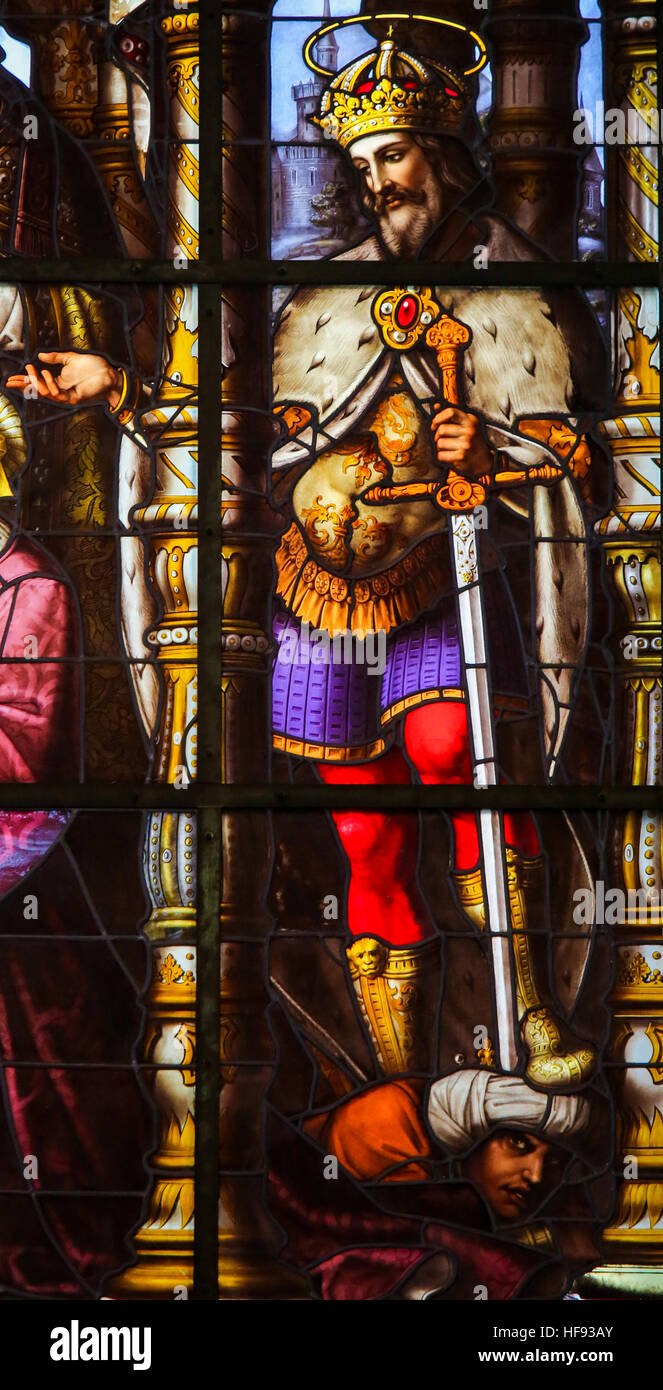 Stained Glass window depicting Saint Louis (King Louis IX of France) in St Nicholas Church in Ghent, Belgium Stock Photo