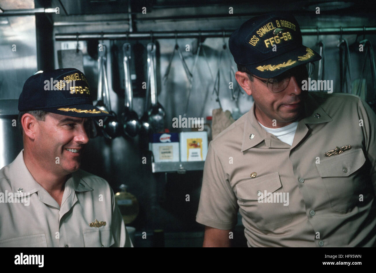 Commander (CDR) John W. Townes III, commanding officer, and CDR Paul X ...