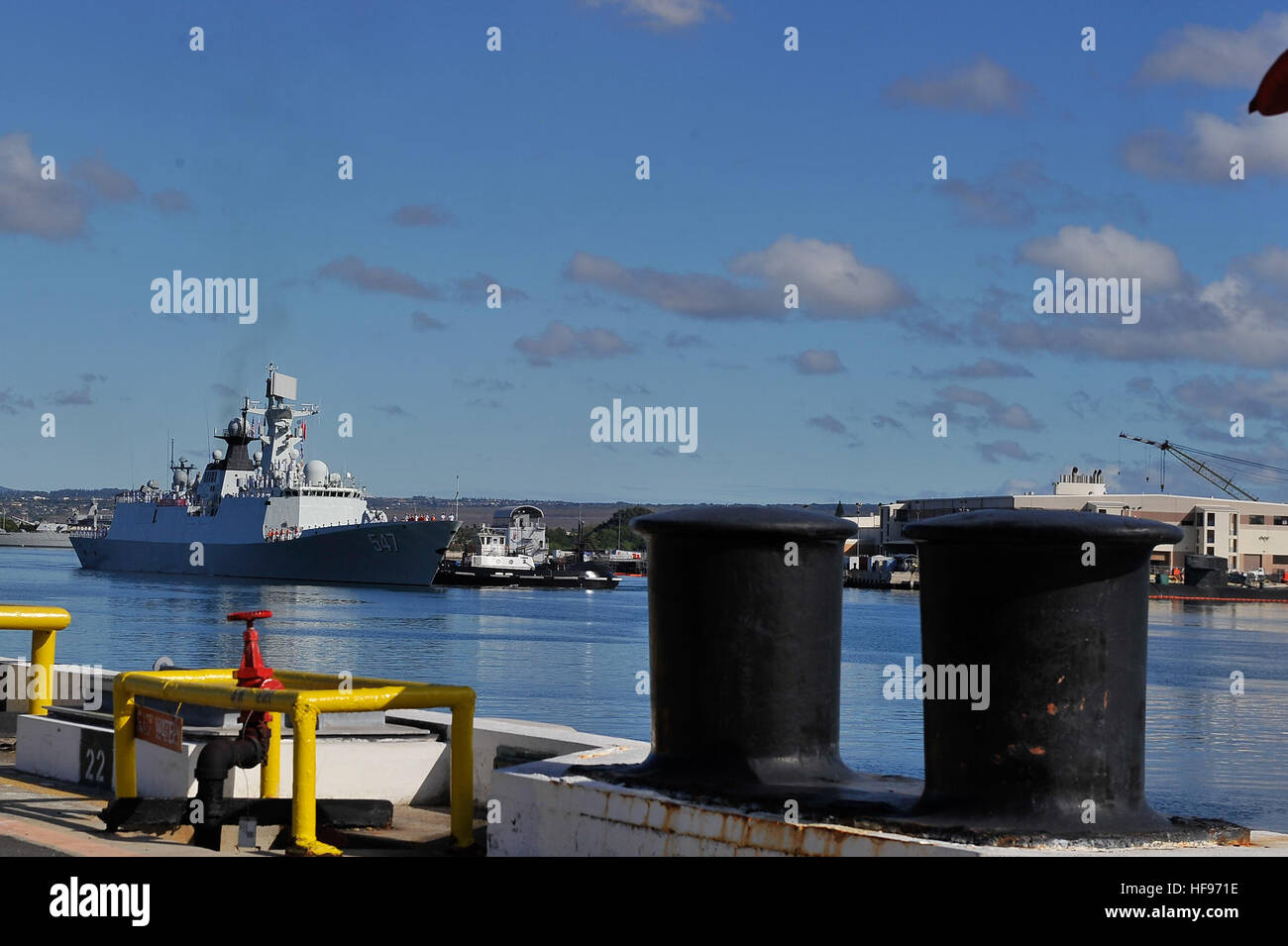 China's People's Liberation Army-Navy Jiangkai-class frigate Linyi (FFG 547) pulls into Joint Base Pearl Harbor-Hickam, Hawaii, Friday, Sept. 6. This port visit is part of the U.S. Navy's ongoing effort to maximize opportunities for developing relationships with foreign navies as a tool to build trust, encourage multilateral cooperation, enhance transparency, and avoid miscalculation in the Pacific. (Department of Defense photo by U.S. Navy Petty Officer 1st Class Cynthia Clark/Released) Chinese navy ships visit Hawaii 130906-N-PJ759-061 Stock Photo