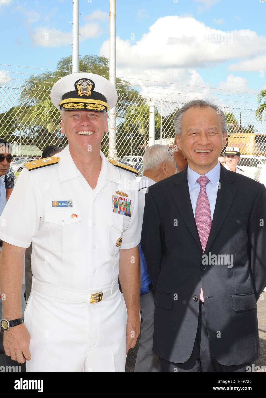 130906-N-ZK021-006 – PEARL HARBOR-HICKAM (Sept. 6, 2013) – Rear Adm. Rick Williams, commander, Navy Region Hawaii and Naval Surface Group Middle Pacific interacts with Ambassador Cui Tiankai, Embassy of China in Washington, DC during an arrival ceremony for three People’s Liberation Army-Navy ships Luhu-class destroyer Qingdao (DDG 113), Jiangkai-class frigate Linyi (FFG 547) and a Fuqing-class fleet oiler as they arrive in Hawaii for a scheduled port visit. Over the weekend, Chinese and U.S. leaders will conduct dialogues to build confidence and mutual understanding between the two nations. T Stock Photo