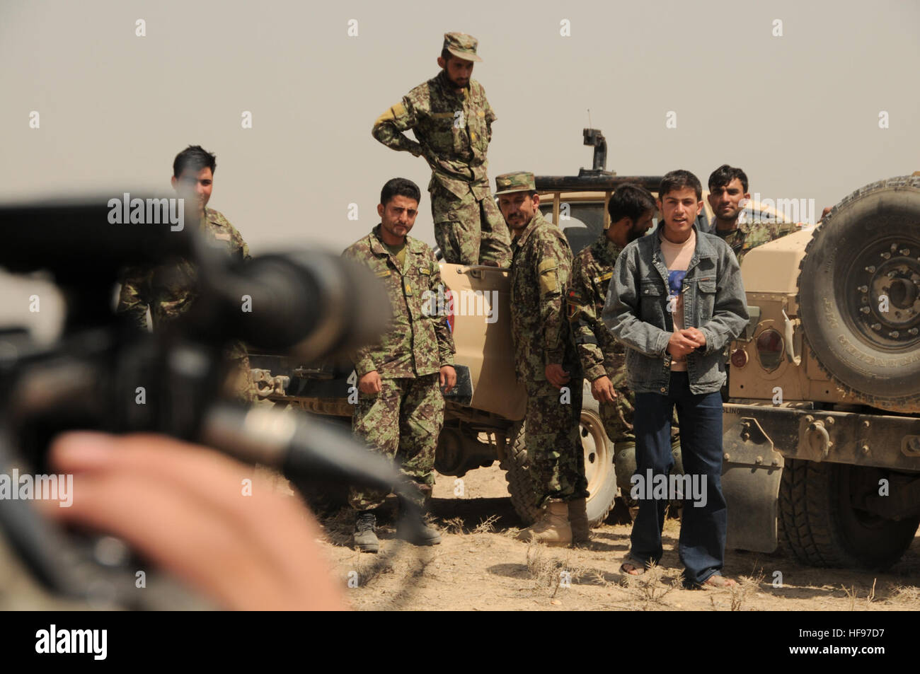 Darulaman, Afghanistan (September 2, 2010) – Sayed Reza Hosainy Adib from  narrates a spot for Noorin TV on a live fire evolution at the Infantry  Branch School in Darulaman. The school teaches