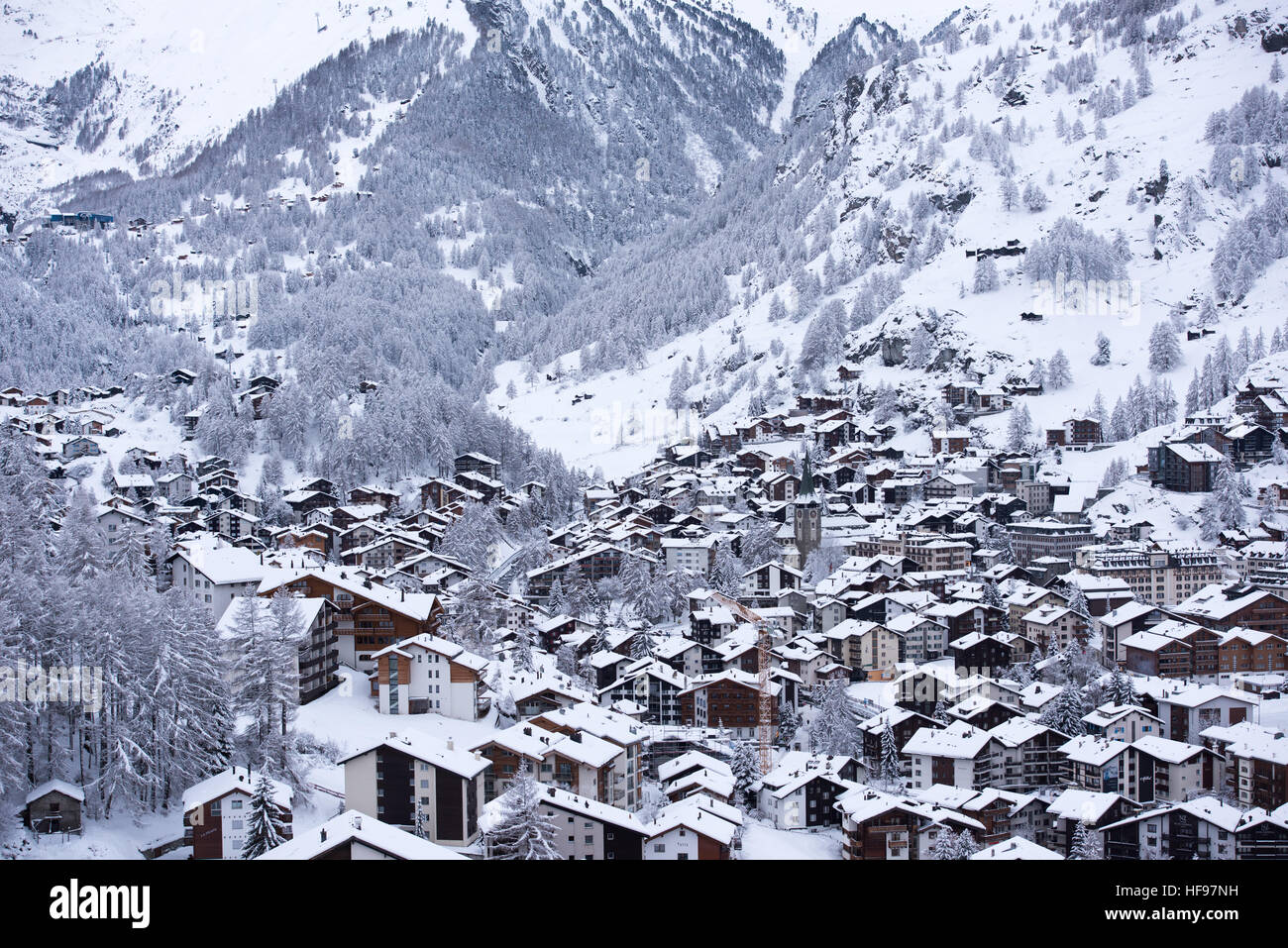aerial view on zermatt valley and matterhorn peak at dusk with fresh ...
