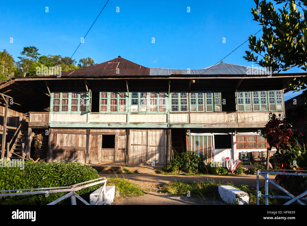 Large wooden house with malay architecture style. Stock Photo