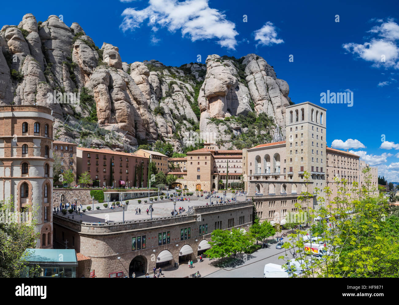 Benedictine Abbey of Santa Maria de Montserrat, framed by mountains. Monistrol de Montserrat, Catalonia, Spain. Stock Photo
