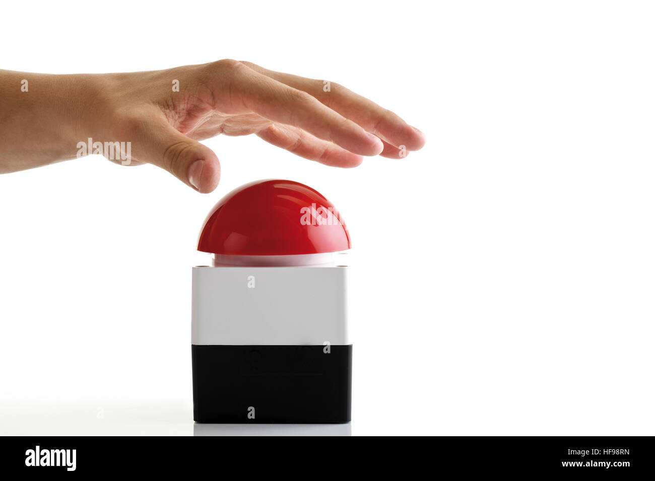 Above The Button Hand above hot button Stock Photo - Alamy