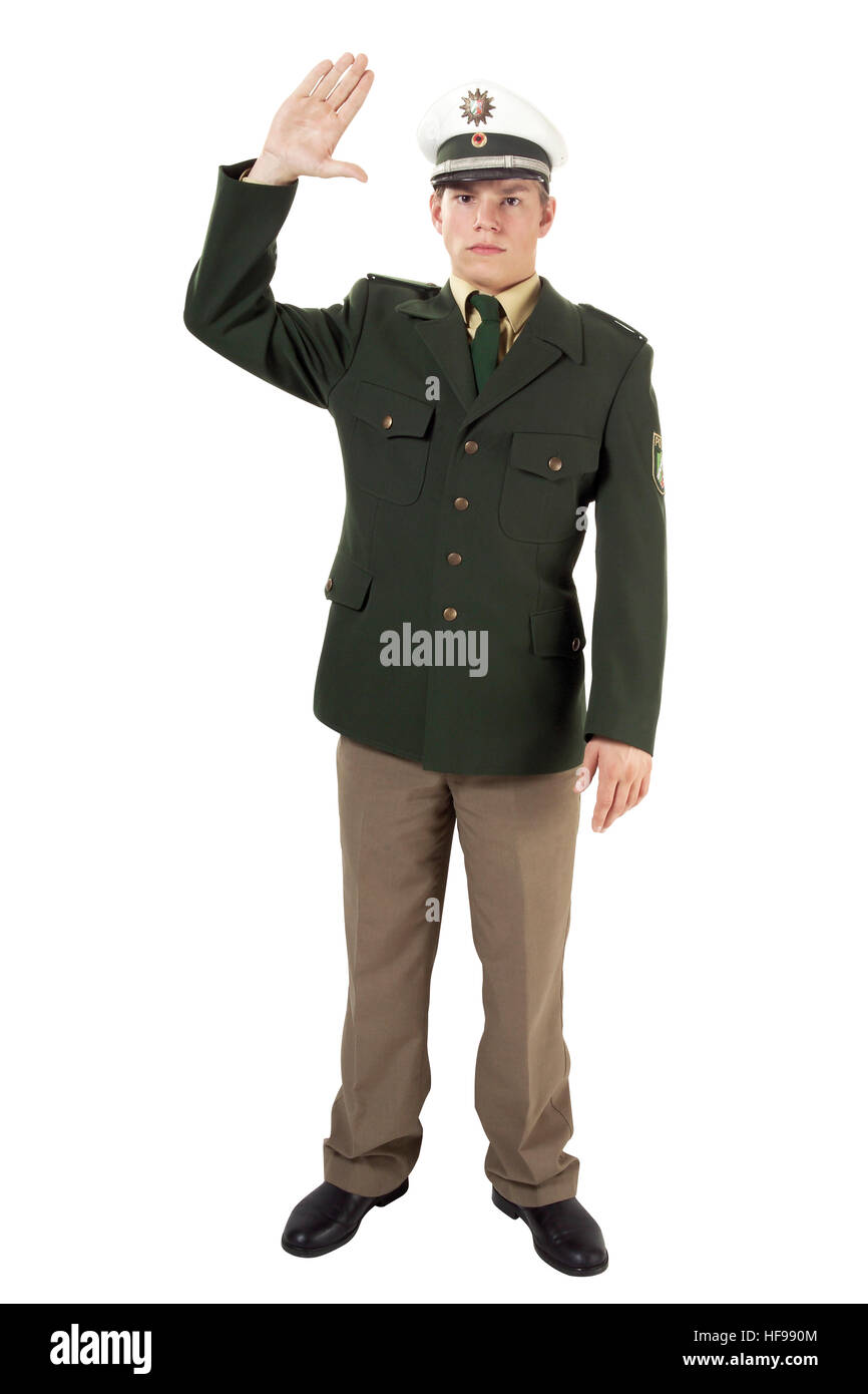 Stop, police! Young policeman signaling to stop (hand signal) Stock Photo