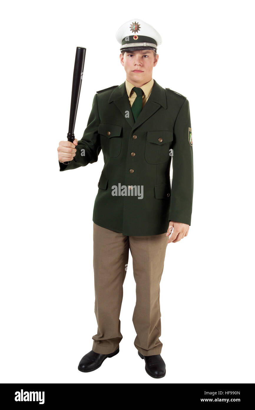 Young policeman holding baton Stock Photo