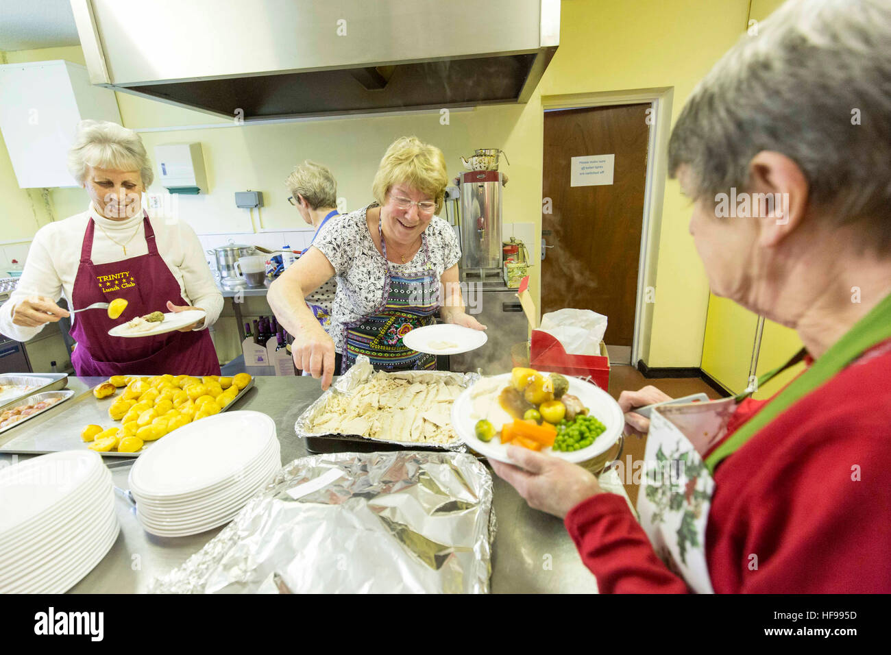 Old people enjoy a Christmas party at Holy Trinity Church Hall , Southport Stock Photo