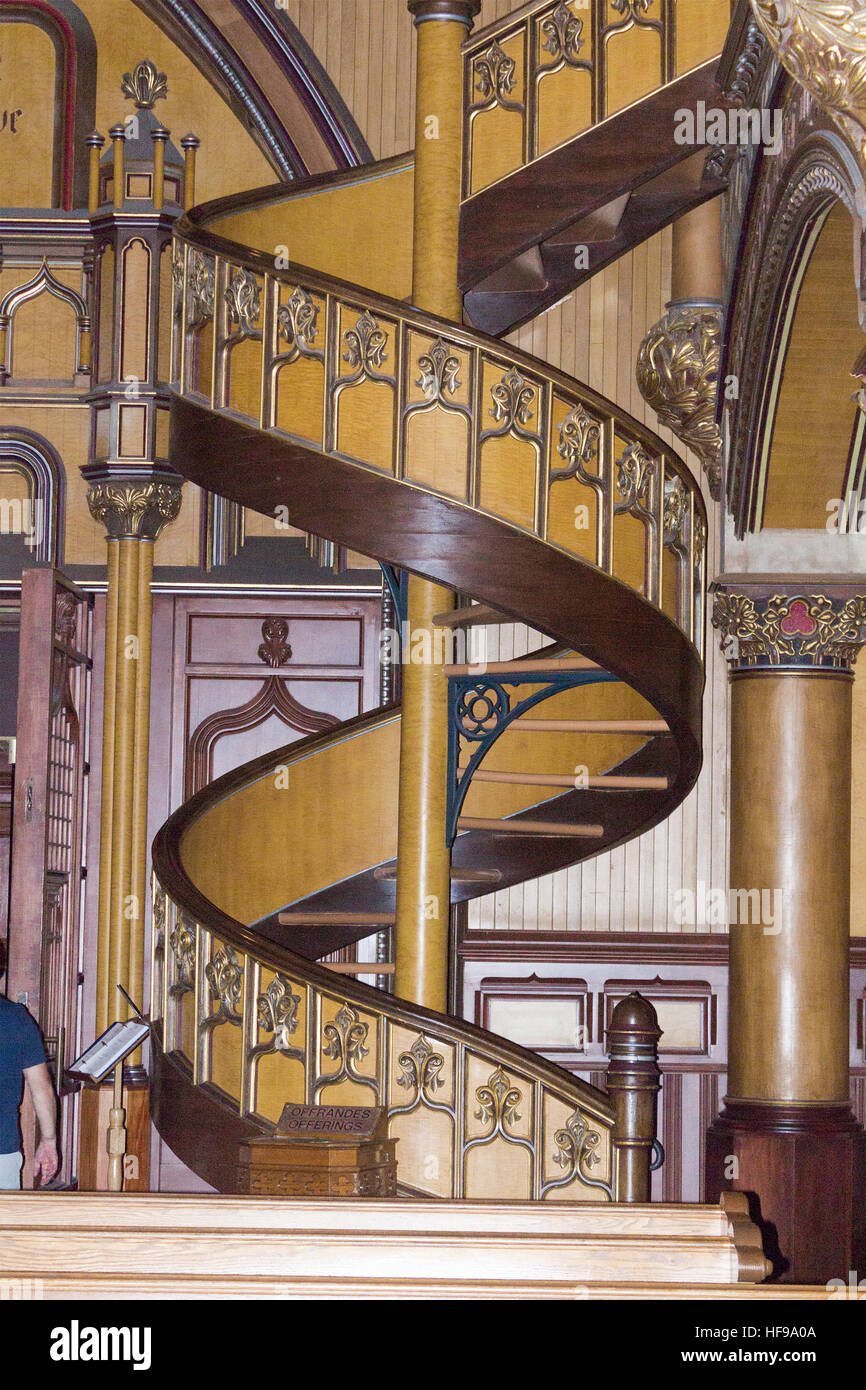 Spiral staircase Notre Dame Basilica Montreal Quebec Canada Gothic architecture cathedral one of Montreal's biggest tourist destinations & attractions Stock Photo