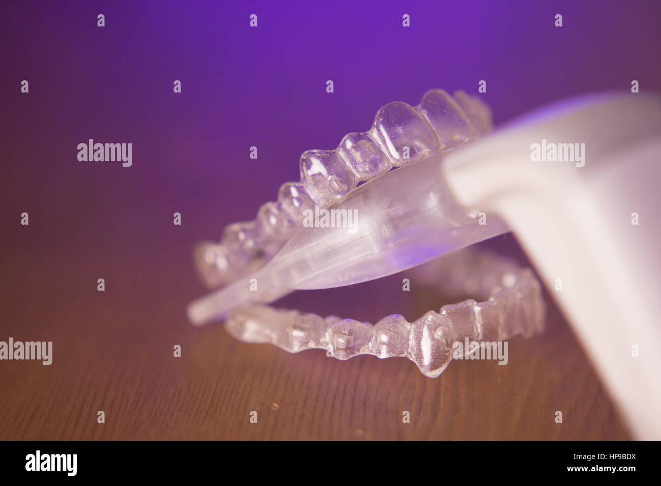 Vibrating dental device with invisible orthodontics Stock Photo Alamy