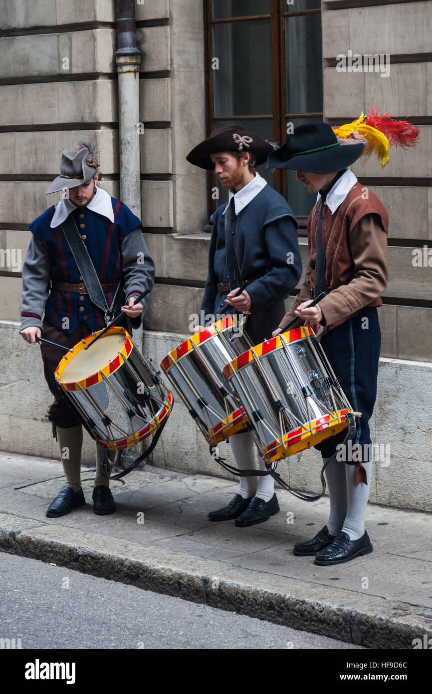 Three young drummers in period costume celebrating Escalade in Geneva Stock Photo